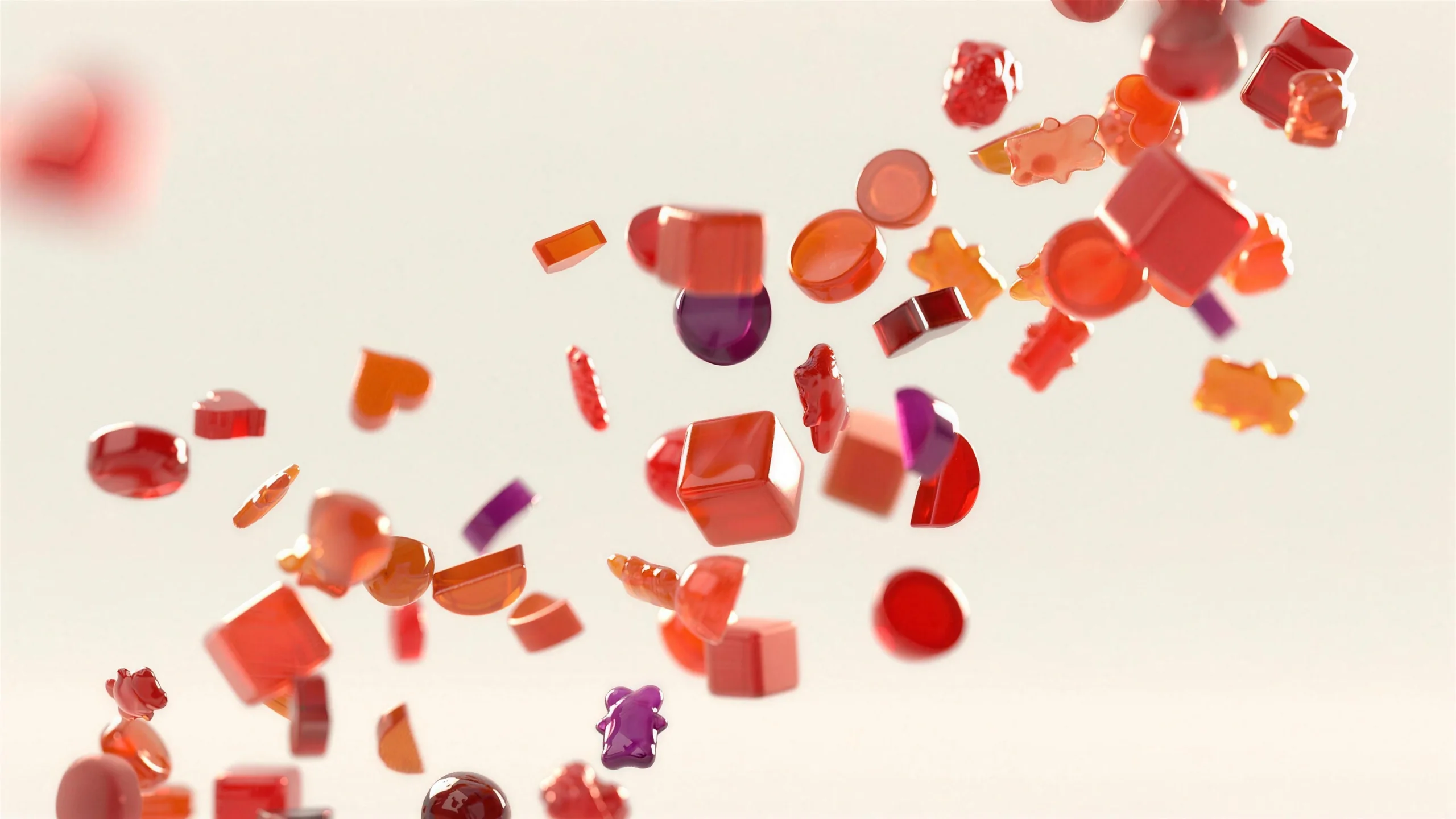 Mixed Clever gummies cascading against a cream backdrop